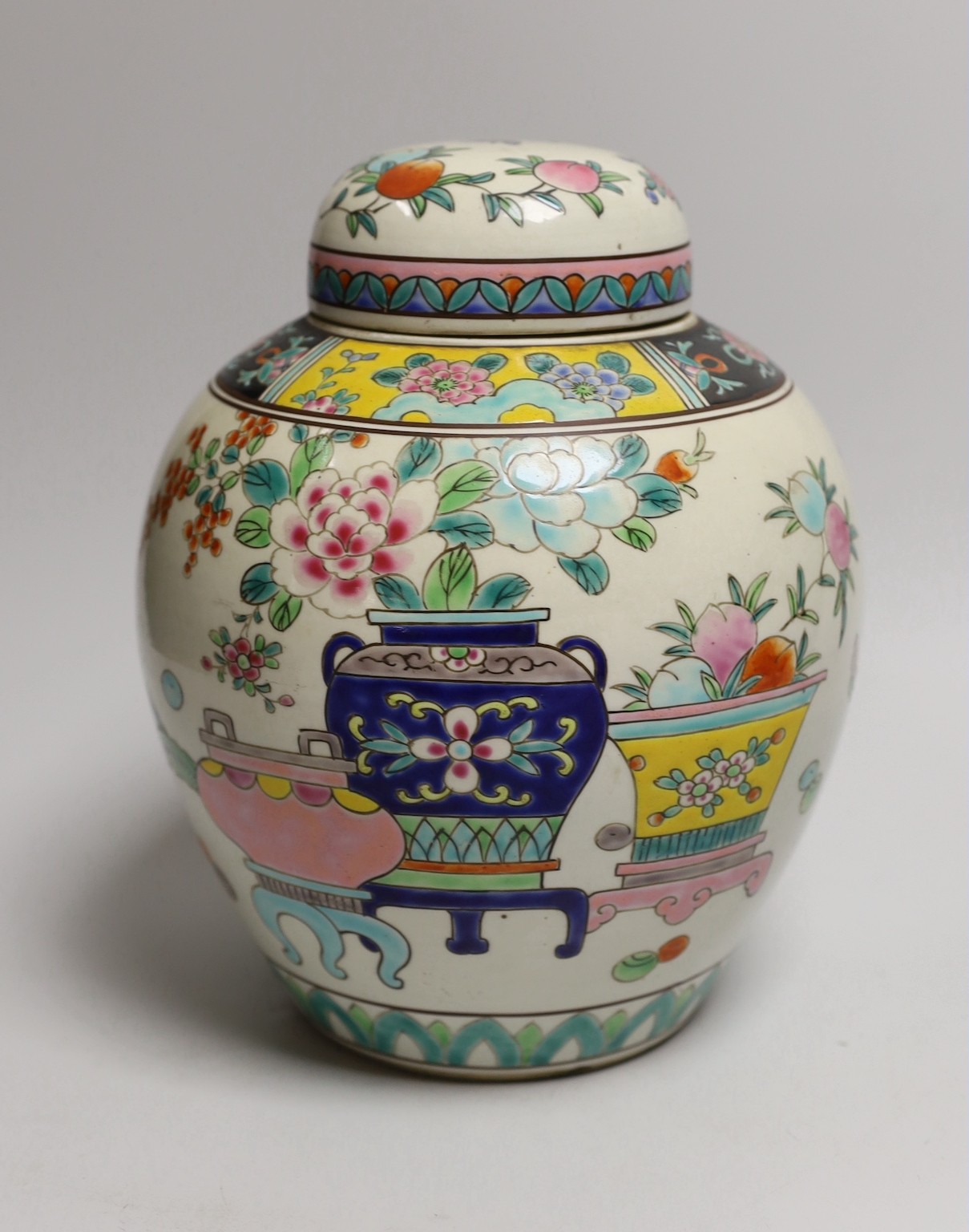 An early 20th century Japanese famille rose jar and cover, 23cms high